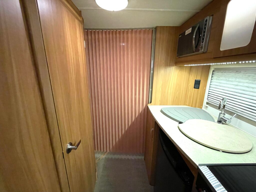 
								Lunar Ultima 560 – 4 Berth Fixed Island Bed Caravan With Awning full									