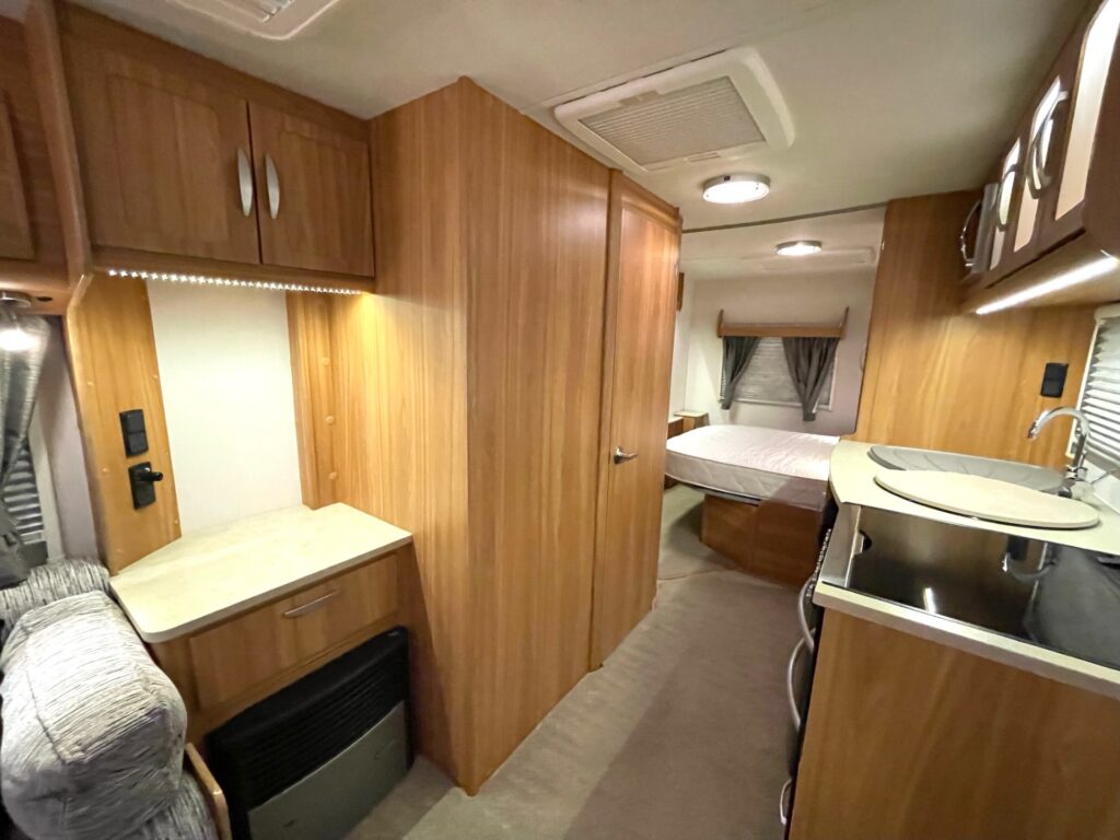 
								Lunar Ultima 560 – 4 Berth Fixed Island Bed Caravan With Awning full									